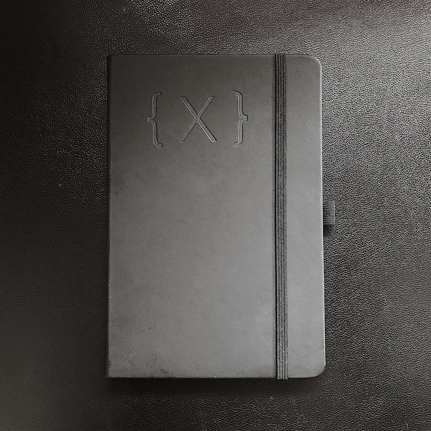 Notebook - {X} Logo